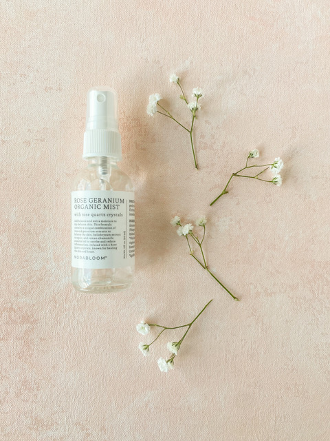 Easy ways to winterize your self-care routine, body mist with sprigs of flowers